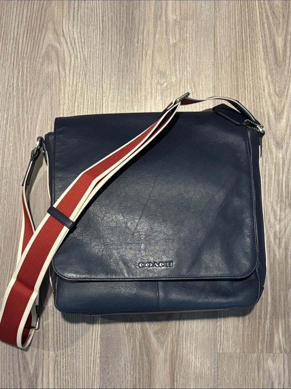 Coach Navy Leather Messenger Bag with Red and White Stripe Strap